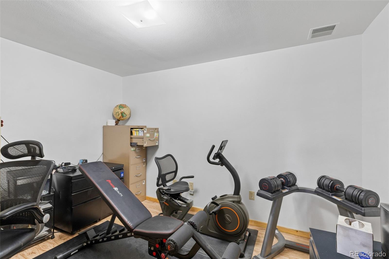 80 Fawn Road Bailey, CO 80421 - Photo 31 of 44 a view of a room with gym equipment