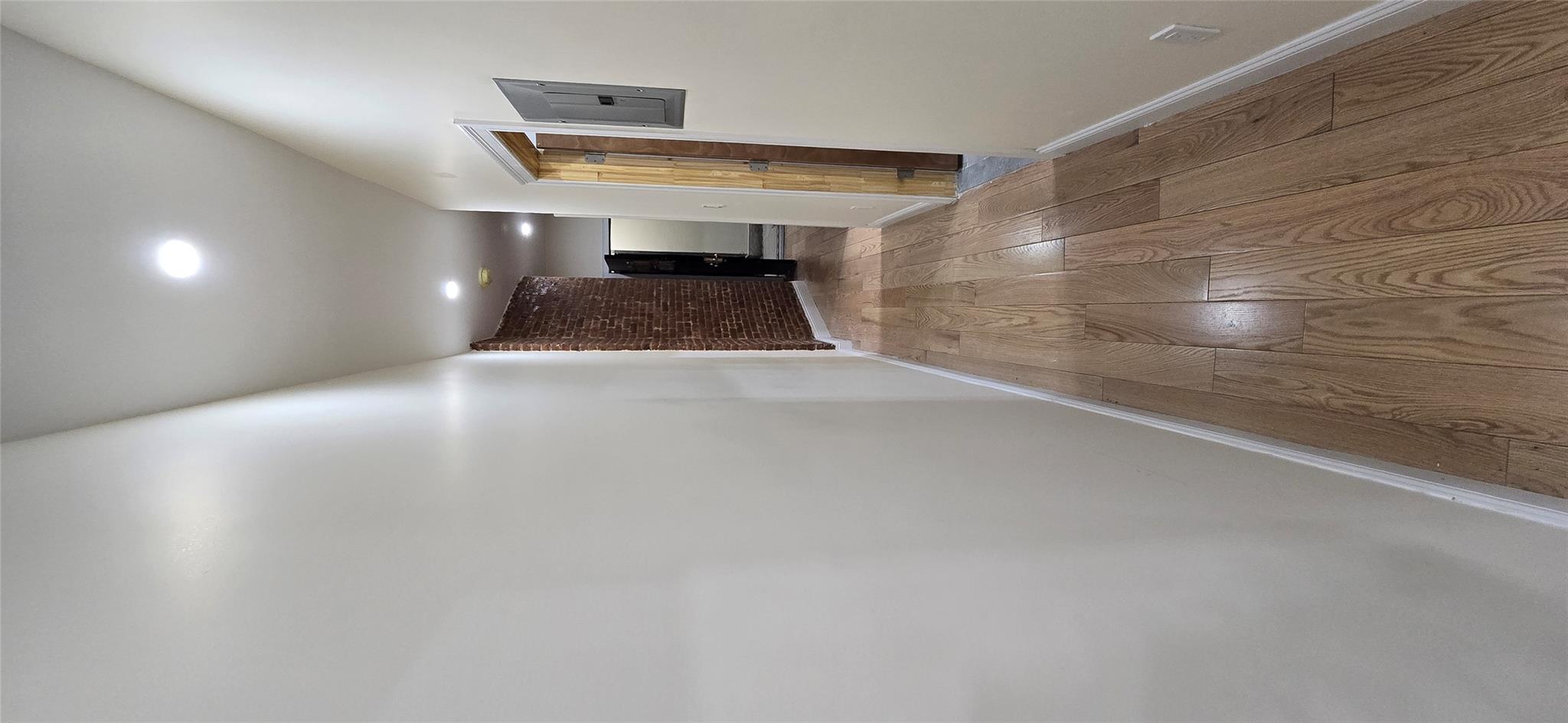 618 Riverside Drive, Unit 24 Manhattan, NY 10031 - Photo 14 of 16 Hallway featuring electric panel, recessed lighting, light wood-type flooring, and baseboards