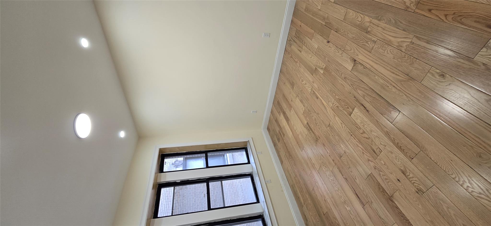 618 Riverside Drive, Unit 24 Manhattan, NY 10031 - Photo 5 of 16 Empty room with recessed lighting, light wood-style floors, and baseboards