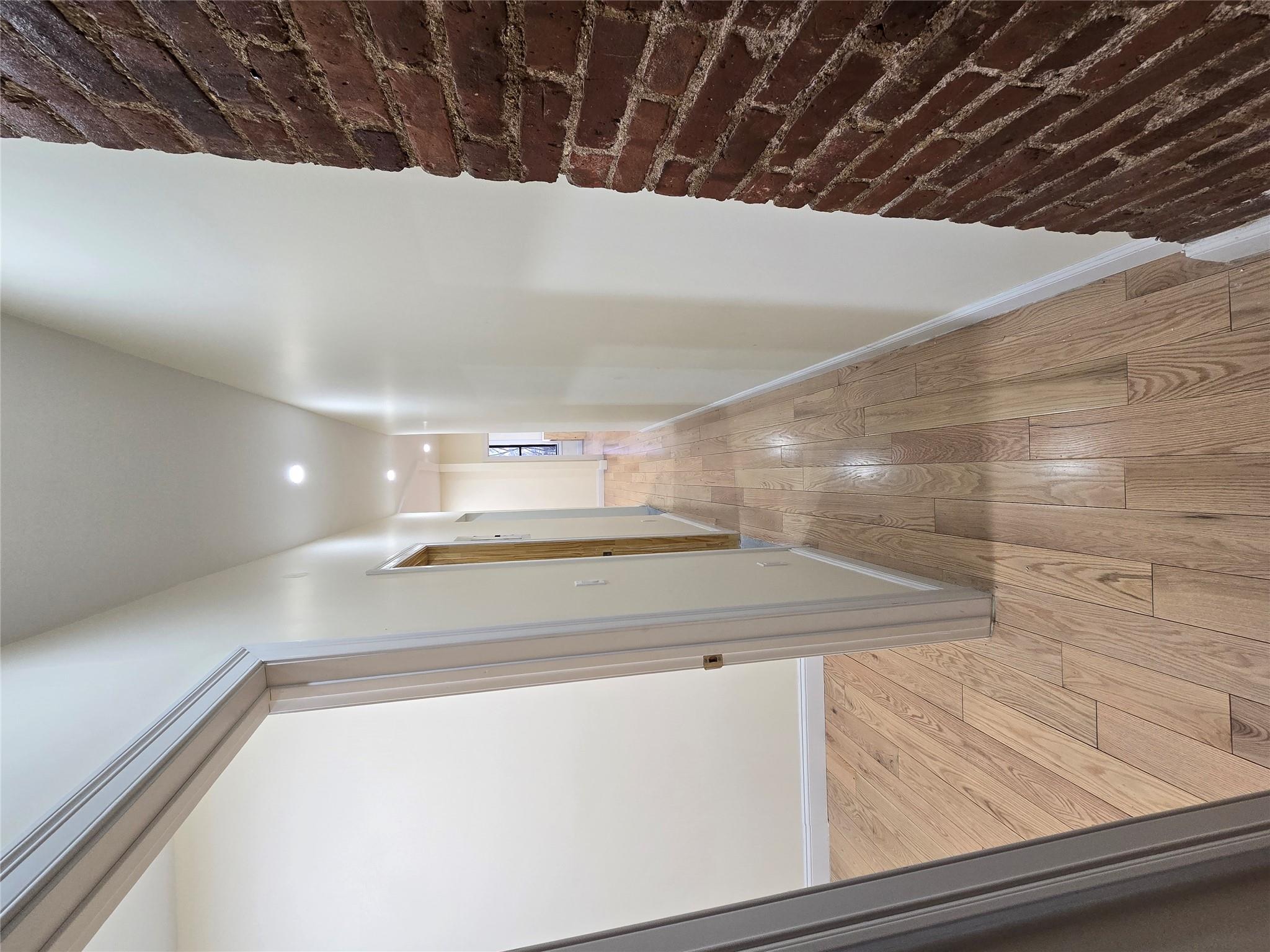 618 Riverside Drive, Unit 24 Manhattan, NY 10031 - Photo 7 of 16 Hall with baseboards, light wood-type flooring, and recessed lighting