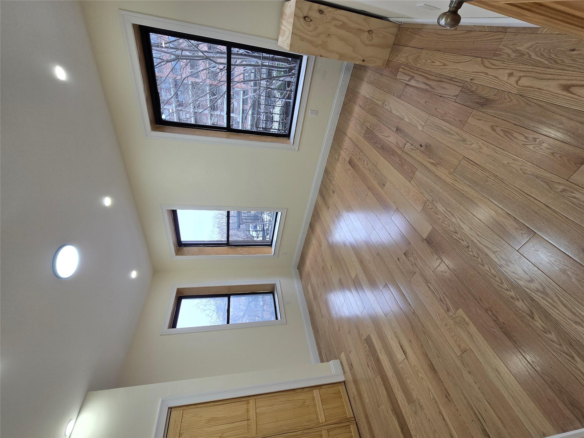 618 Riverside Drive, Unit 24 Manhattan, NY 10031 - Photo 10 of 16 Empty room featuring light wood-style floors, baseboards, and recessed lighting