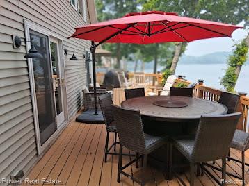 6807 Big Trail Road Holly, MI 48442 - Photo 26 of 45 Expansive wood deck with a full railing system