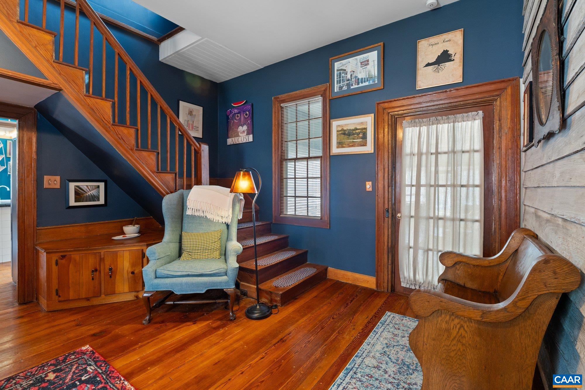 14910 Western Mill Road Lawrenceville, VA 23868 - Photo 26 of 73 a living room with furniture fireplace and a window