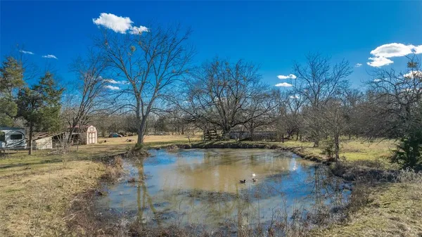 a view of a lake with a house