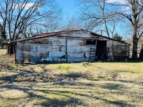 a front view of house with a yard