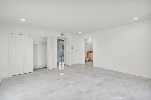 a view of an chairs in front of house