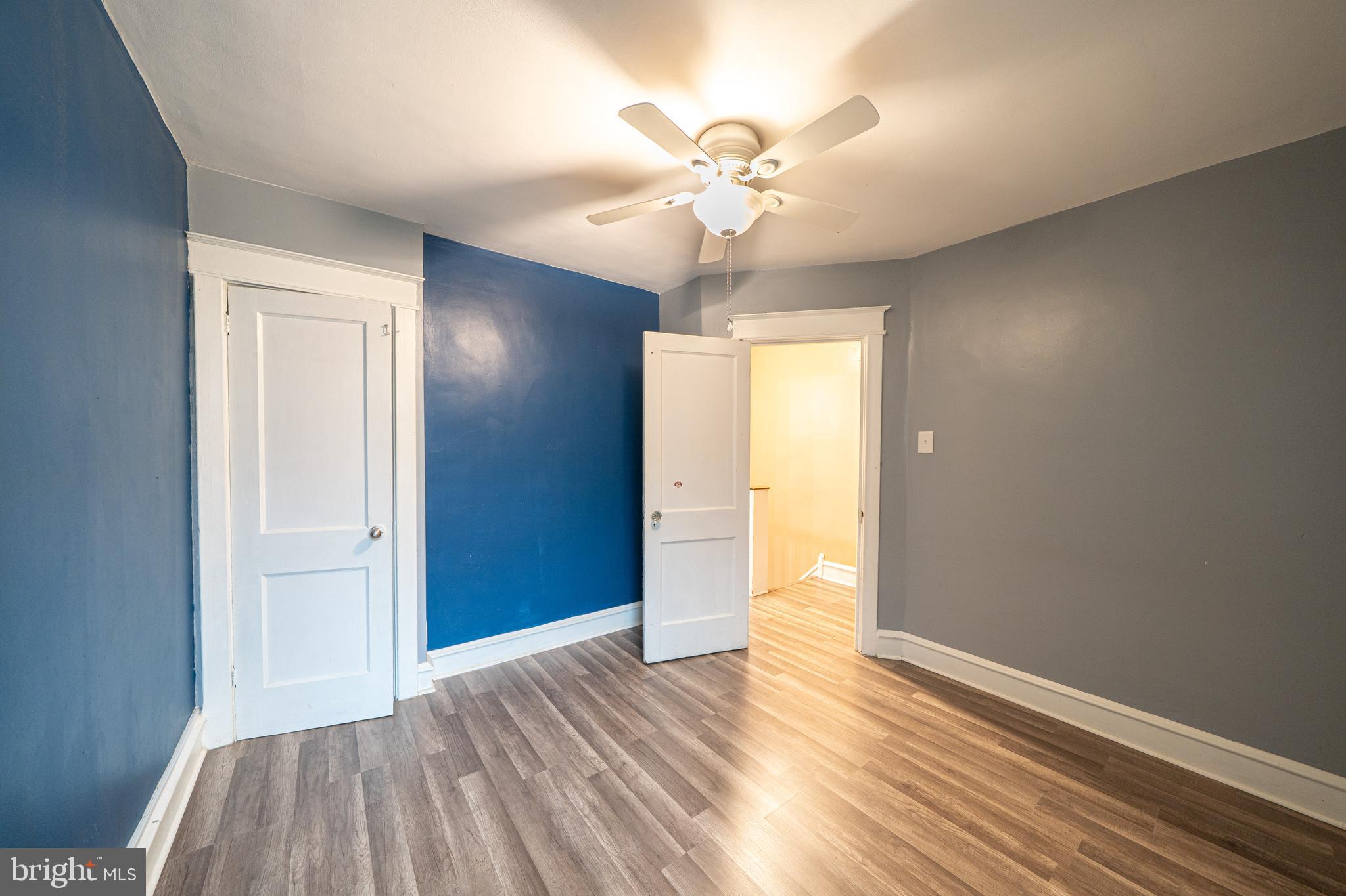 4141 Stirling Street Philadelphia, PA 19135 - Photo 18 of 24 a view of an empty room with wooden floor