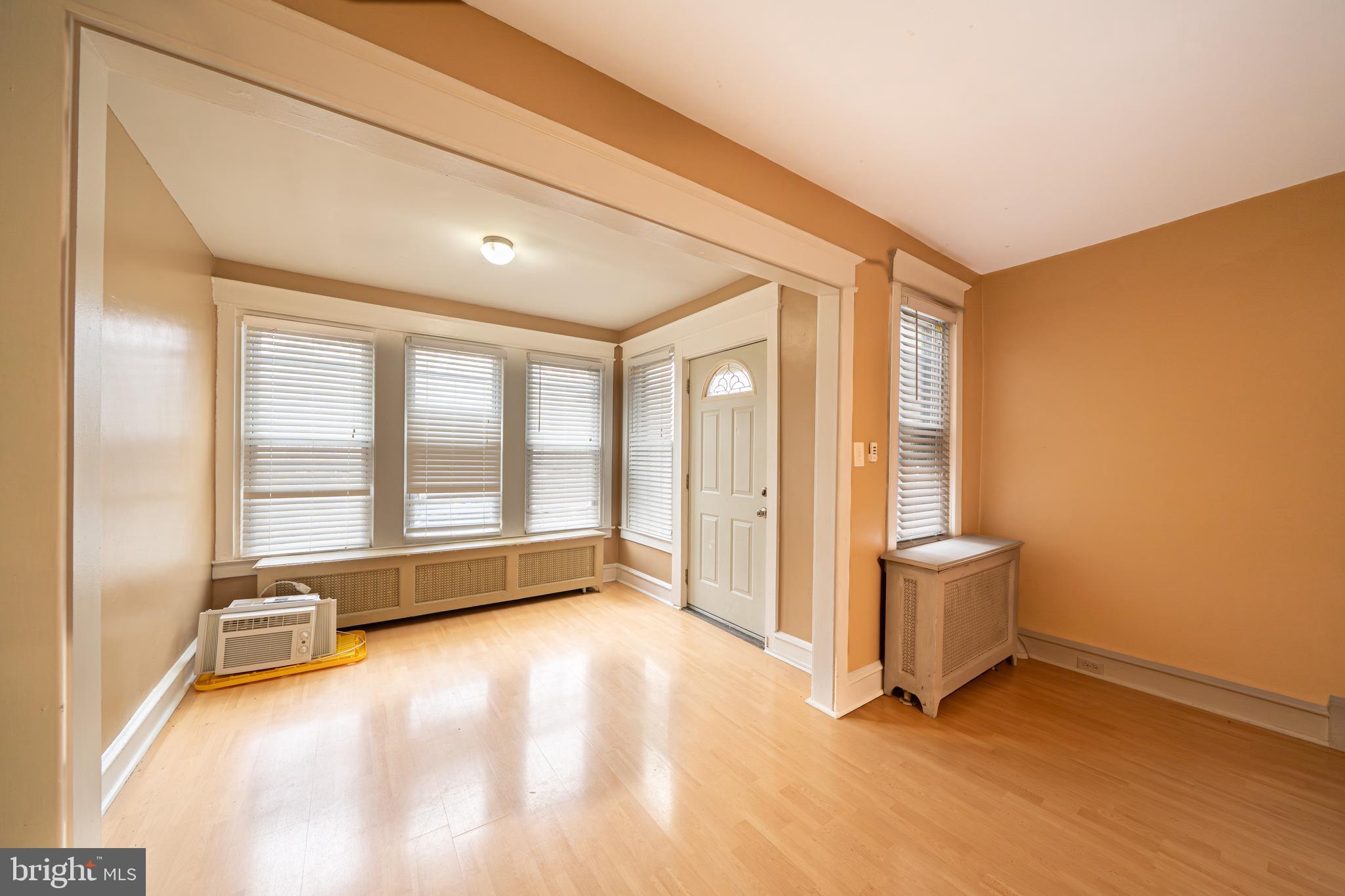 4141 Stirling Street Philadelphia, PA 19135 - Photo 5 of 24 a view of an empty room and a window