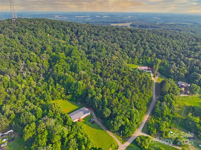 a view of a yard with an outdoor space