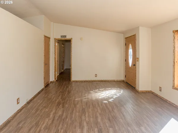 a view of a livingroom with wooden floor