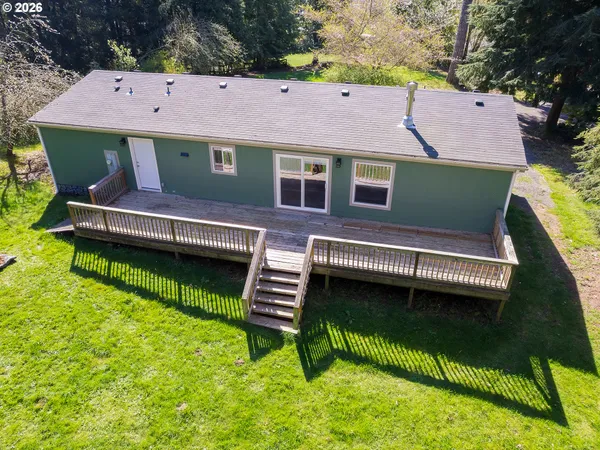 a aerial view of a house with a patio