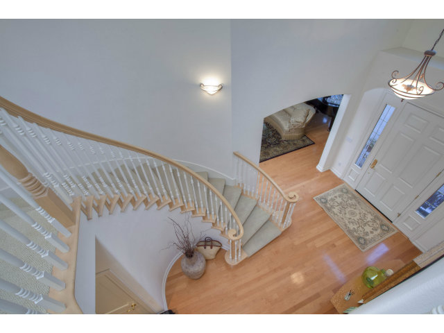 151 Cypress Point Road Half Moon Bay, CA 94019 - Photo 15 of 25 a view of a bedroom with furniture and a rug