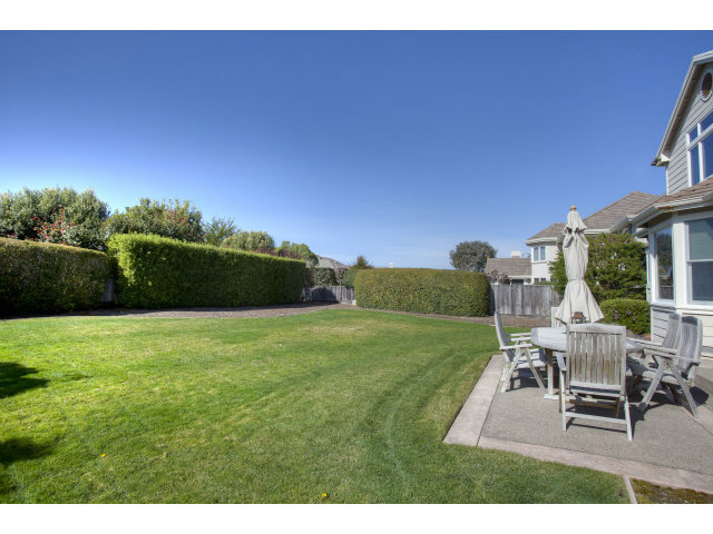 151 Cypress Point Road Half Moon Bay, CA 94019 - Photo 24 of 25 a view of a chairs and table on the green field