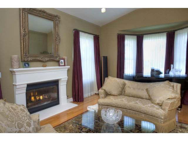 151 Cypress Point Road Half Moon Bay, CA 94019 - Photo 5 of 25 a living room with furniture and a fireplace