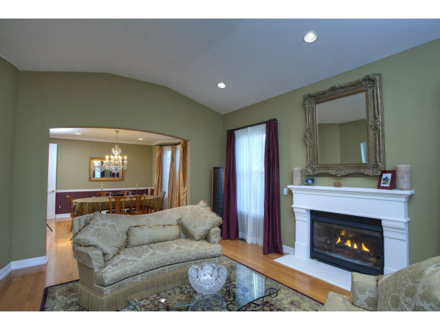 151 Cypress Point Road Half Moon Bay, CA 94019 - Photo 6 of 25 a living room with furniture and a fireplace