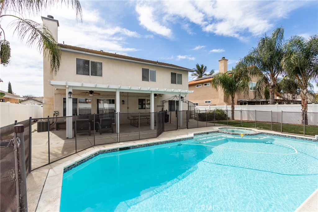 25588 Pelion Road Menifee, CA 92584 - Photo 36 of 43 a view of a house with pool and sitting area