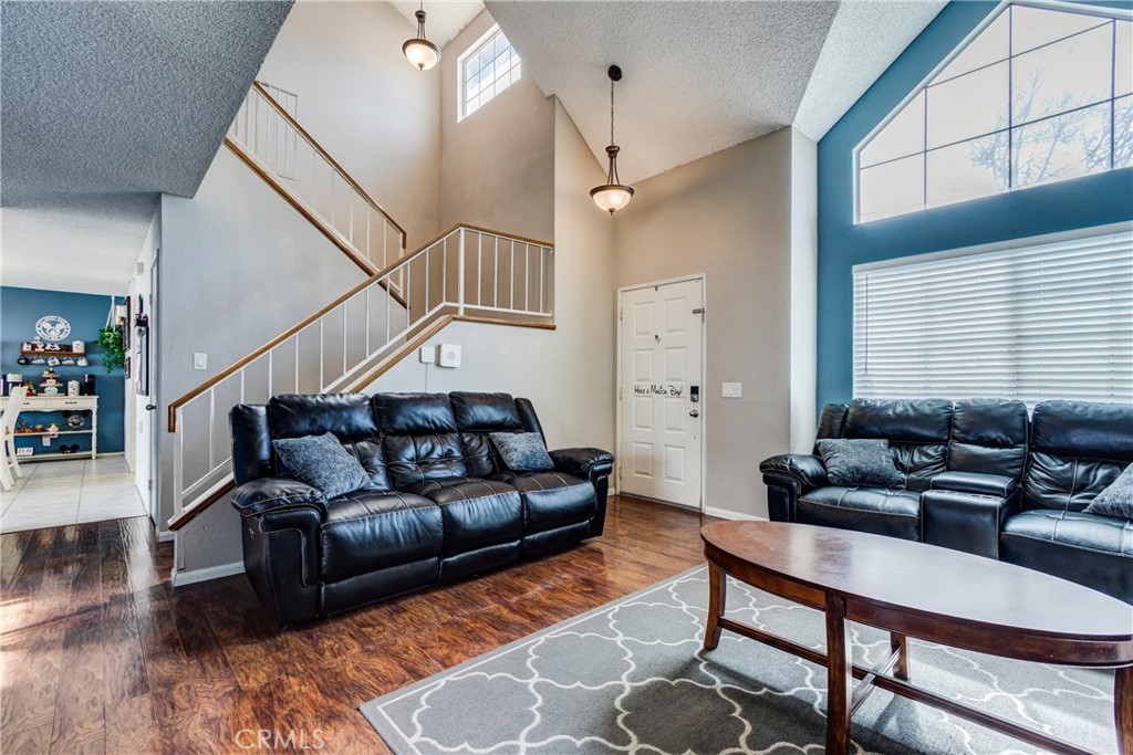 25588 Pelion Road Menifee, CA 92584 - Photo 7 of 43 a living room with furniture and wooden floor