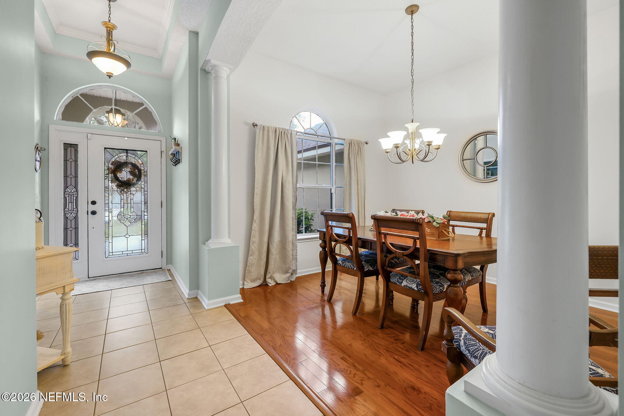 4320 Rye Court St. Johns, FL 32259 - Photo 7 of 60 a view of a dining room with furniture wooden floor and chandelier