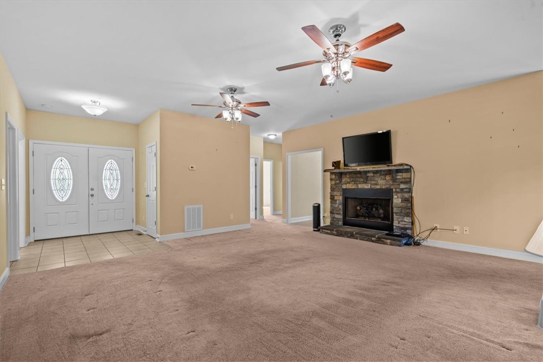 203 Ridge Springs Road Cleveland, SC 29635 - Photo 4 of 38 Living room with fireplace, facing front entrance.