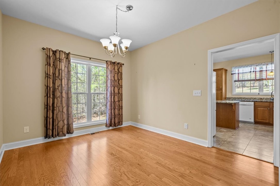203 Ridge Springs Road Cleveland, SC 29635 - Photo 9 of 38 Formal dining room off the kitchen