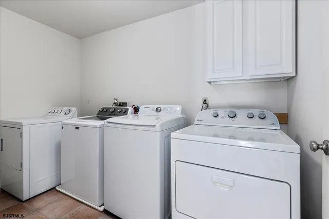 a bathroom with a sink vanity and mirror