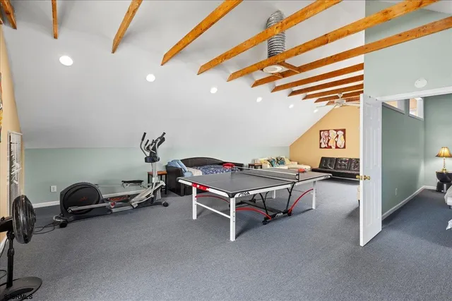 a view of a lake with a building in the background