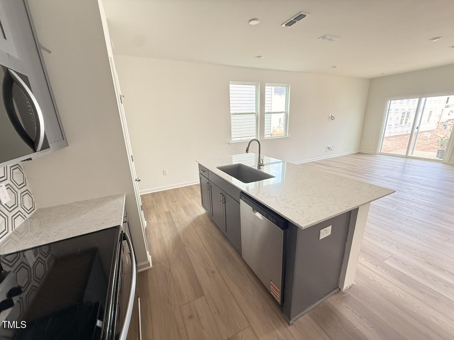 2206 Rabbitbrush Street Durham, NC 27704 - Photo 4 of 16 AR193 1st floor side