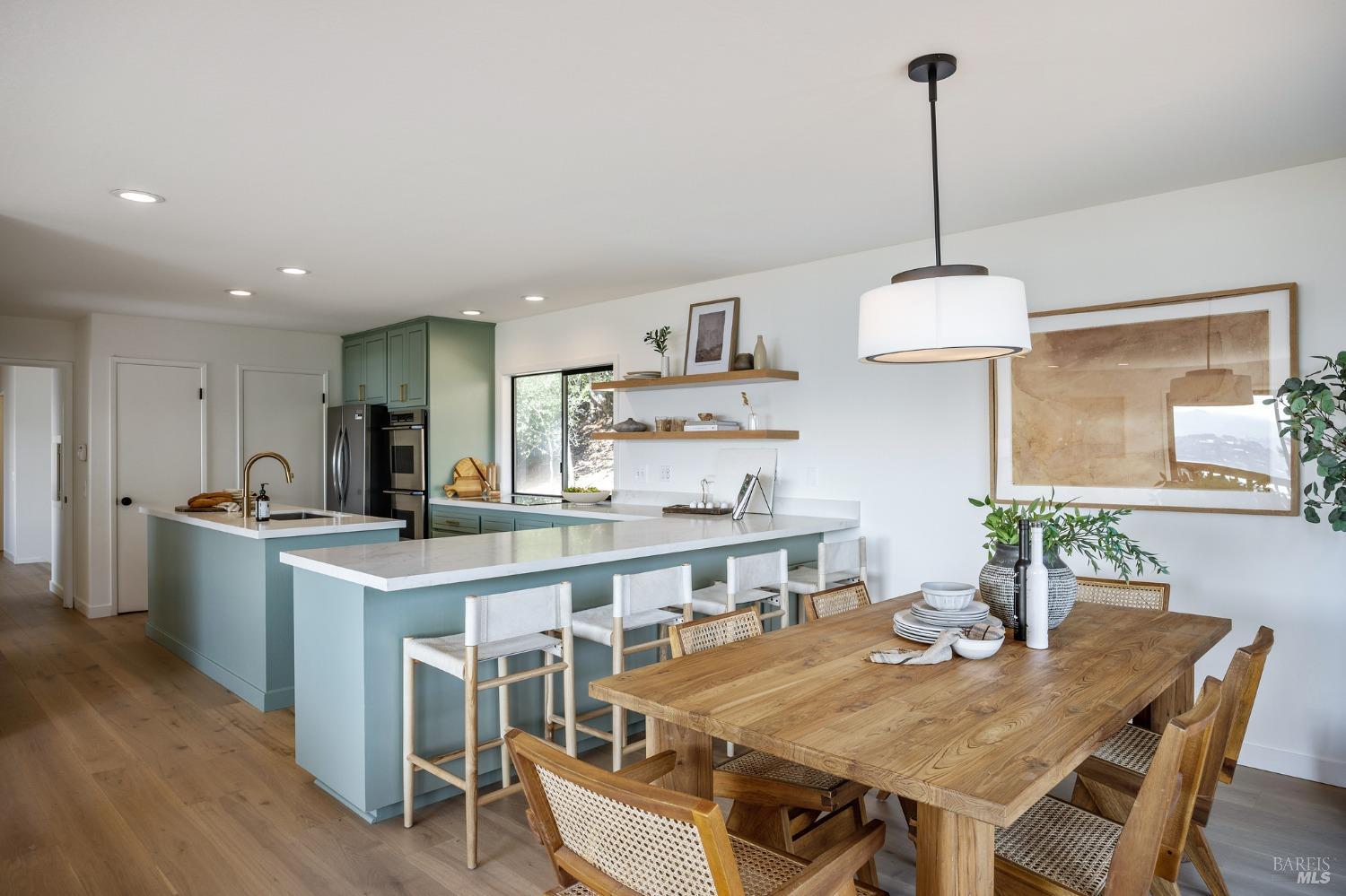 115 Geldert Drive Tiburon, CA 94920 - Photo 17 of 57 a kitchen with stainless steel appliances granite countertop a sink a stove a refrigerator and wooden floor
