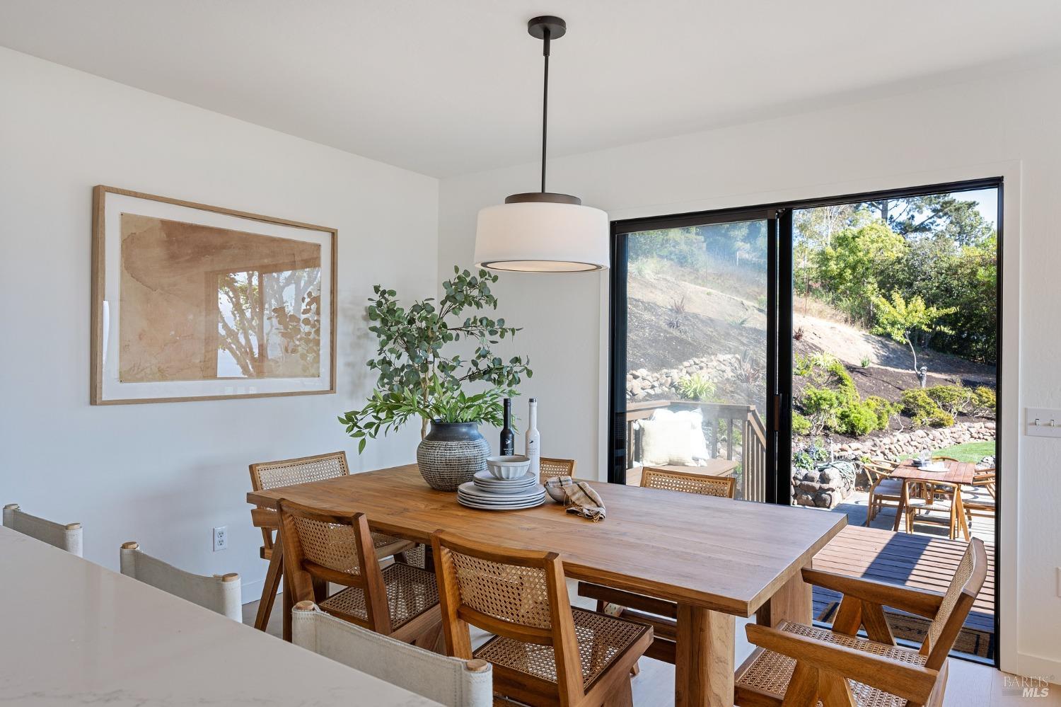 115 Geldert Drive Tiburon, CA 94920 - Photo 19 of 57 a dining room with furniture window and wooden floor