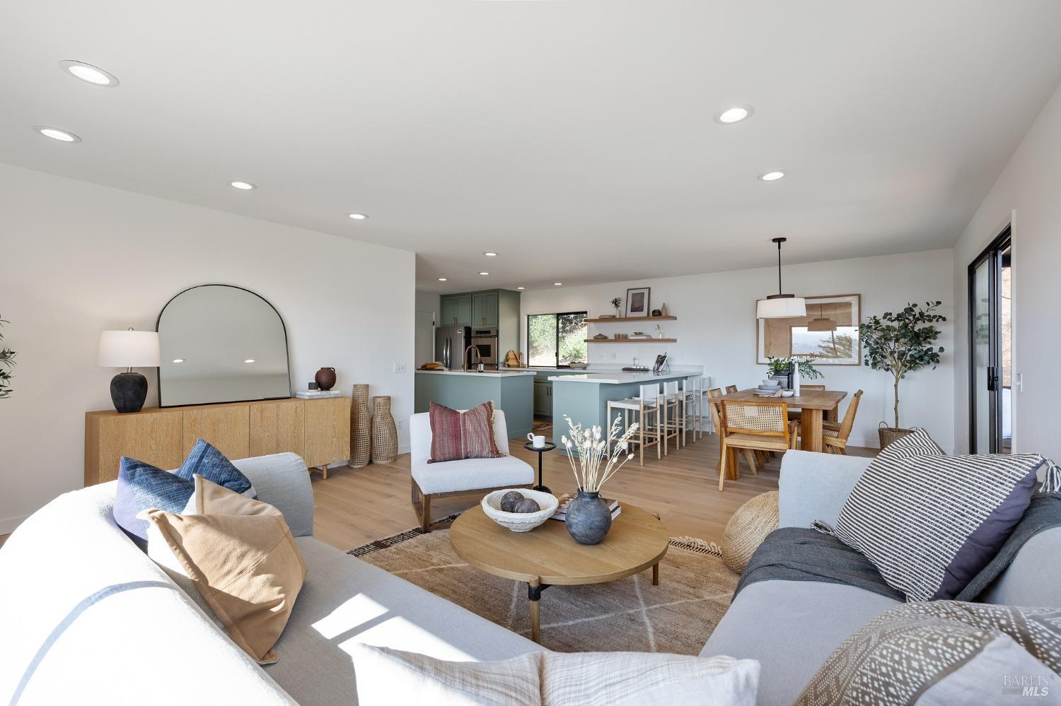 115 Geldert Drive Tiburon, CA 94920 - Photo 20 of 57 a living room with furniture and a wooden floor