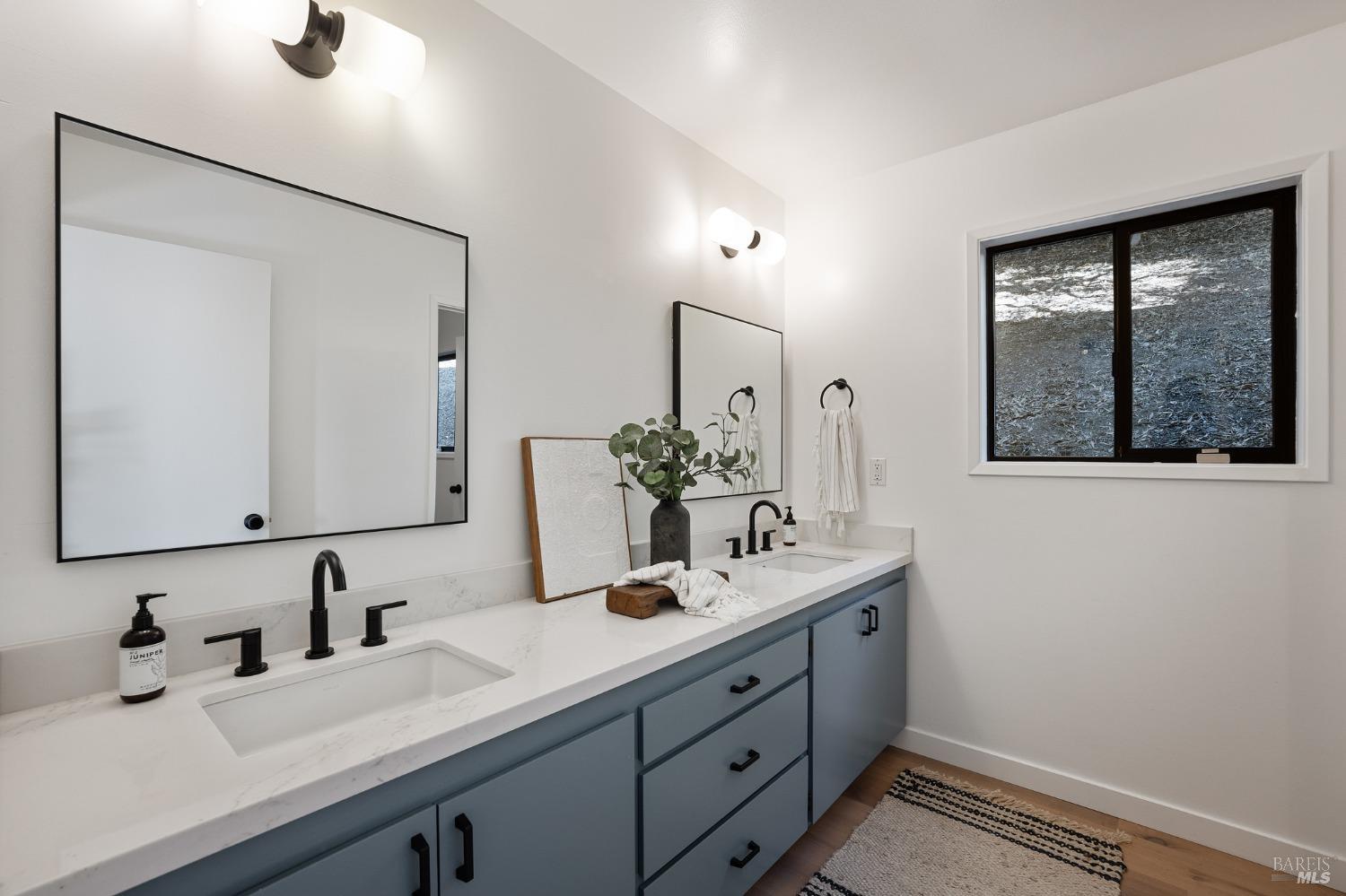 115 Geldert Drive Tiburon, CA 94920 - Photo 41 of 57 a bathroom with a double vanity sink mirror and