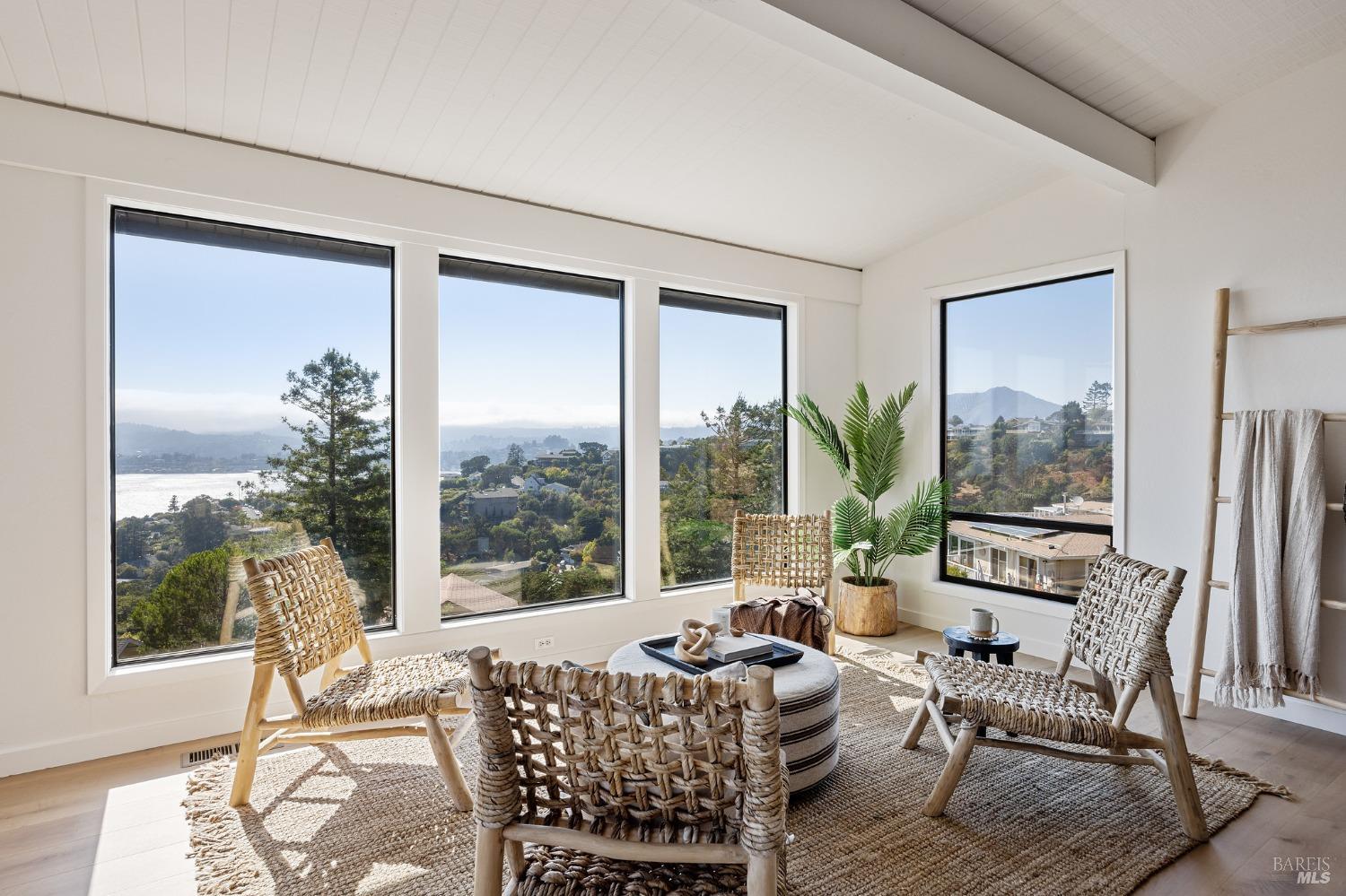 115 Geldert Drive Tiburon, CA 94920 - Photo 9 of 57 a living room with furniture and large windows
