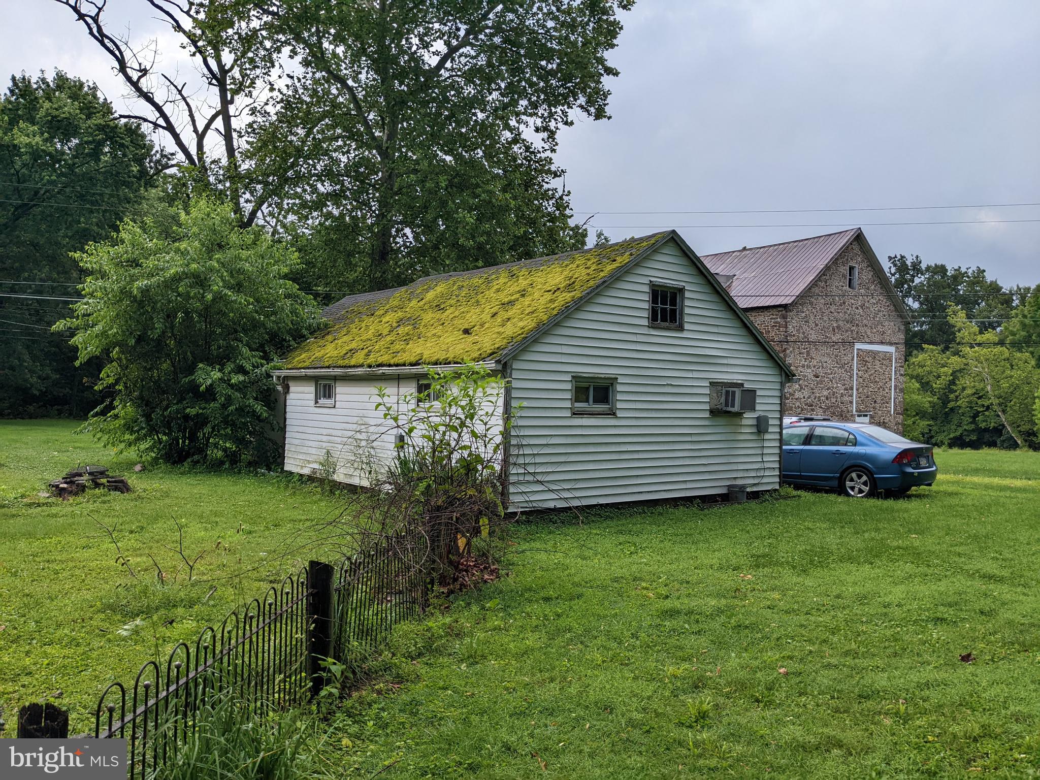 79 Spotts Mill Road Douglassville, PA 19518 - Photo 11 of 27 a view of a house with a yard and plants