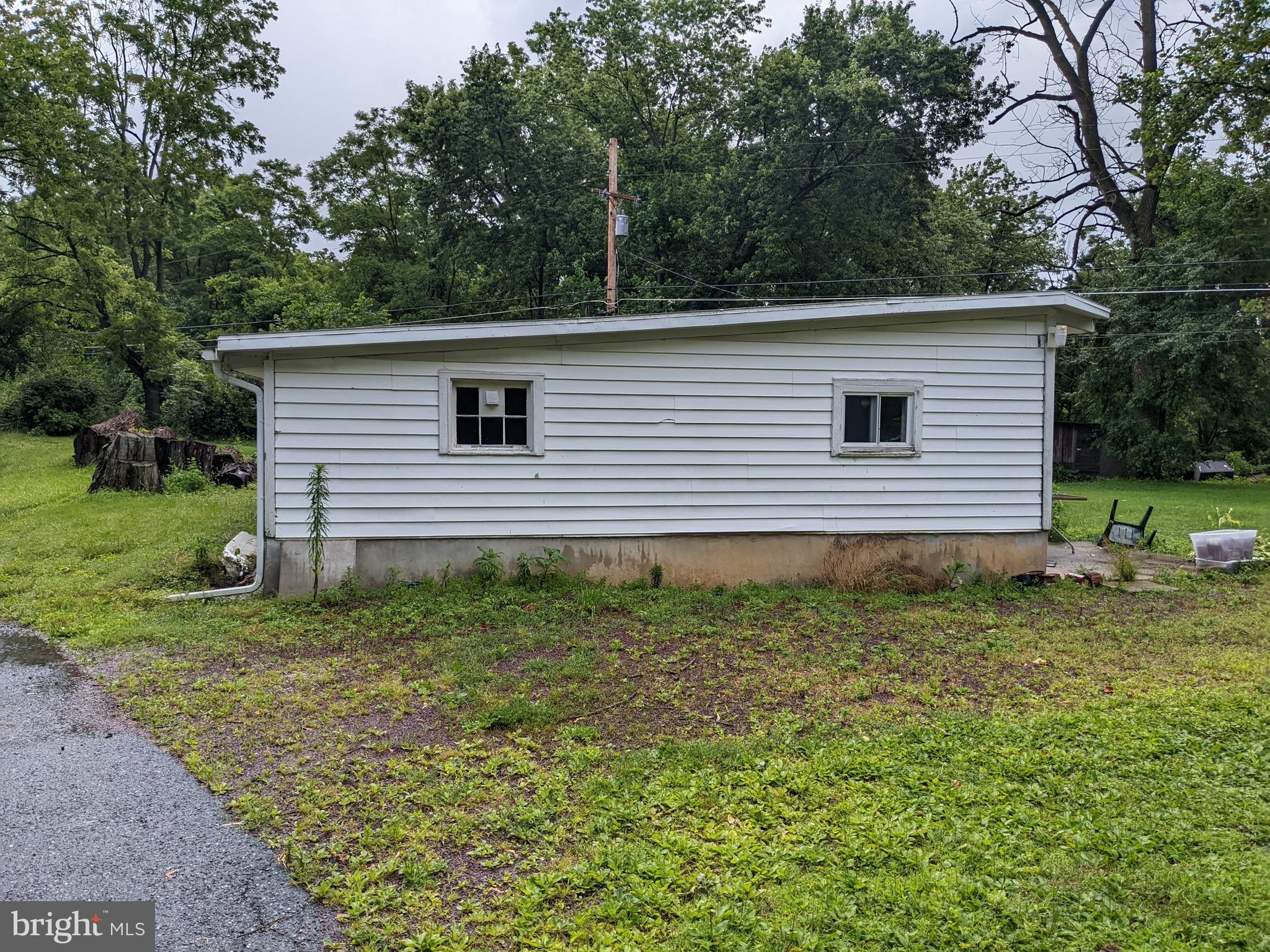 79 Spotts Mill Road Douglassville, PA 19518 - Photo 12 of 27 a view of a house with a backyard