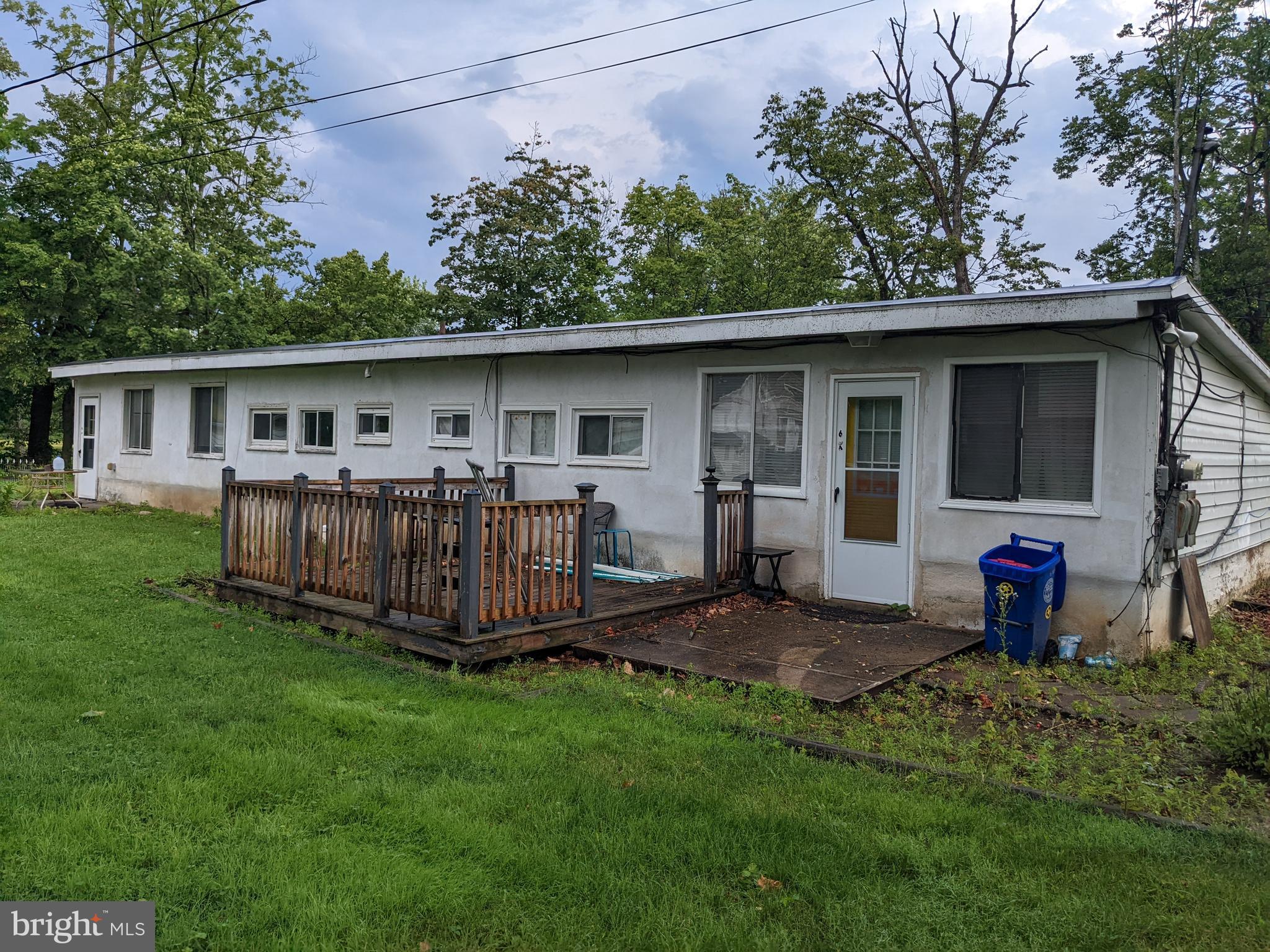 79 Spotts Mill Road Douglassville, PA 19518 - Photo 15 of 27 a view of a house with a yard and sitting area