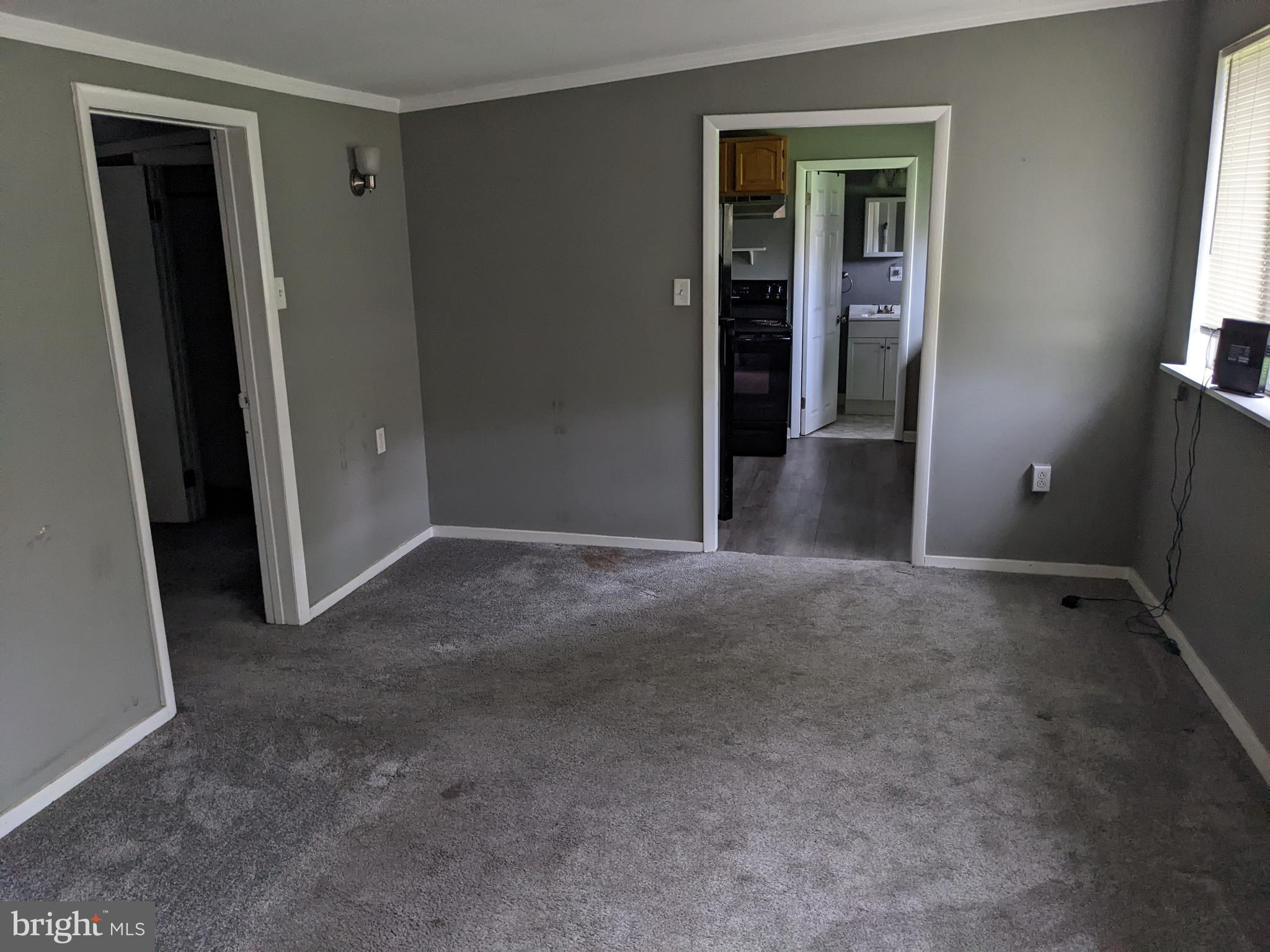 79 Spotts Mill Road Douglassville, PA 19518 - Photo 17 of 27 an empty room with closet and windows