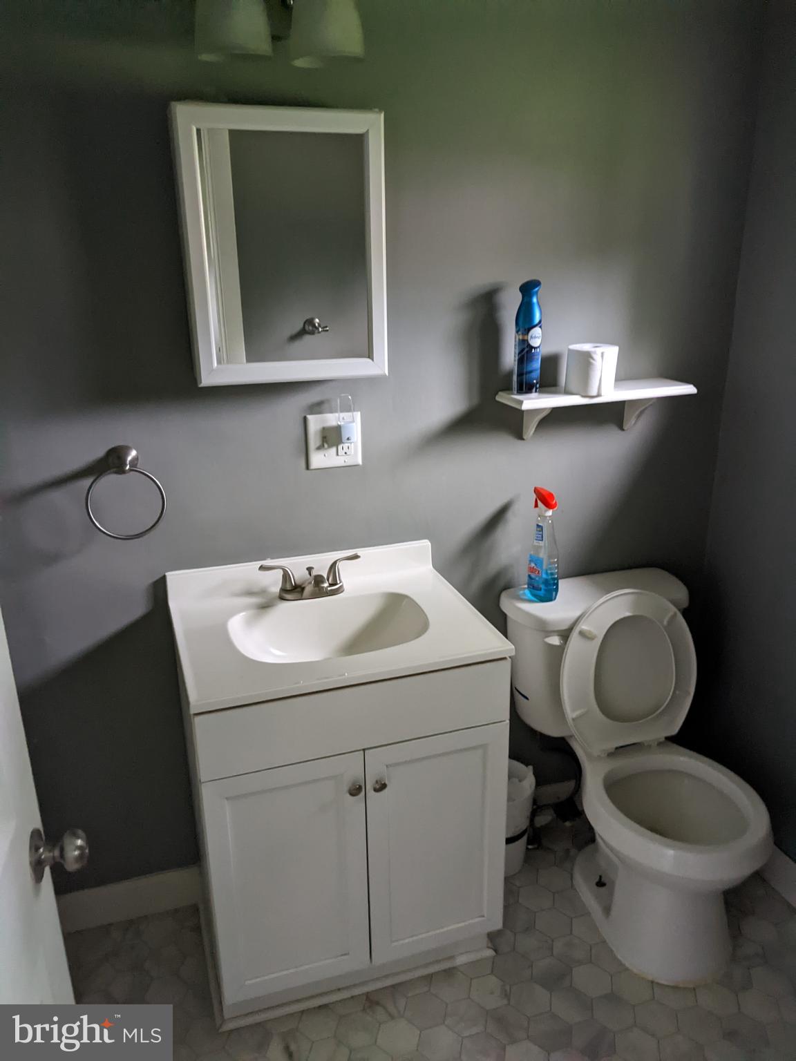 79 Spotts Mill Road Douglassville, PA 19518 - Photo 19 of 27 a bathroom with a toilet sink and mirror