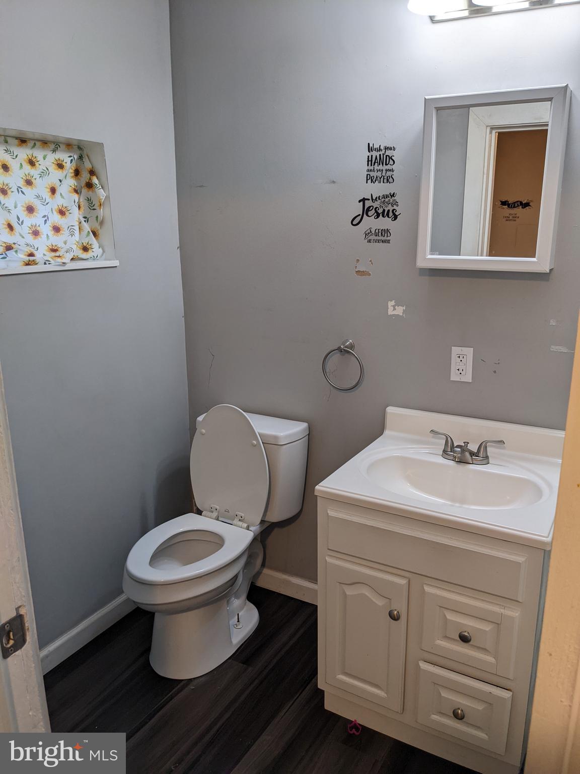79 Spotts Mill Road Douglassville, PA 19518 - Photo 22 of 27 a bathroom with a toilet sink and mirror