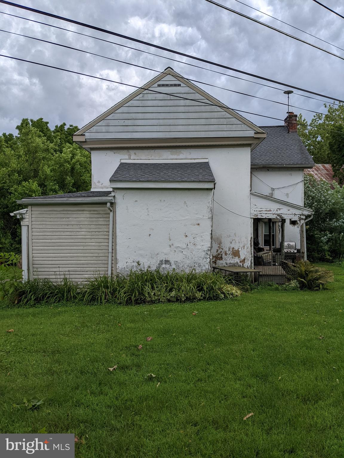 79 Spotts Mill Road Douglassville, PA 19518 - Photo 3 of 27 a front view of house with a garden