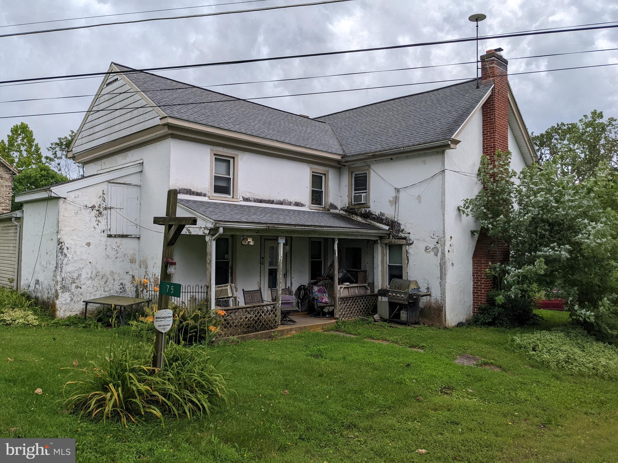 79 Spotts Mill Road Douglassville, PA 19518 - Photo 4 of 27 a view of a house with patio