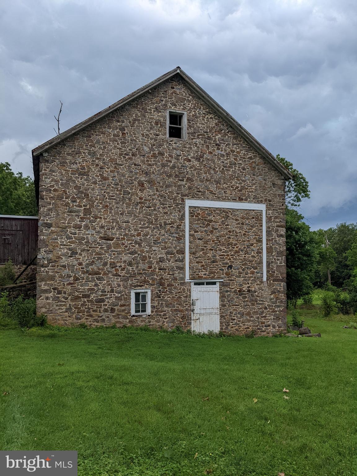 79 Spotts Mill Road Douglassville, PA 19518 - Photo 9 of 27 front view of a house with a yard