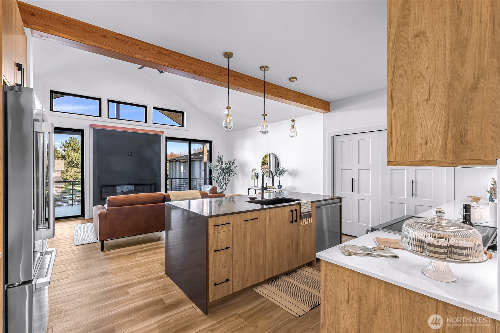 220 Skipping Stone Loop Lynden, WA 98264 - Photo 11 of 26 a kitchen with stainless steel appliances granite countertop a sink stove and refrigerator