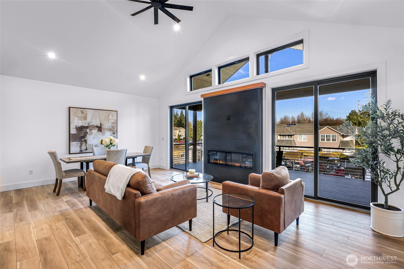 220 Skipping Stone Loop Lynden, WA 98264 - Photo 15 of 26 a living room with furniture and a floor to ceiling window