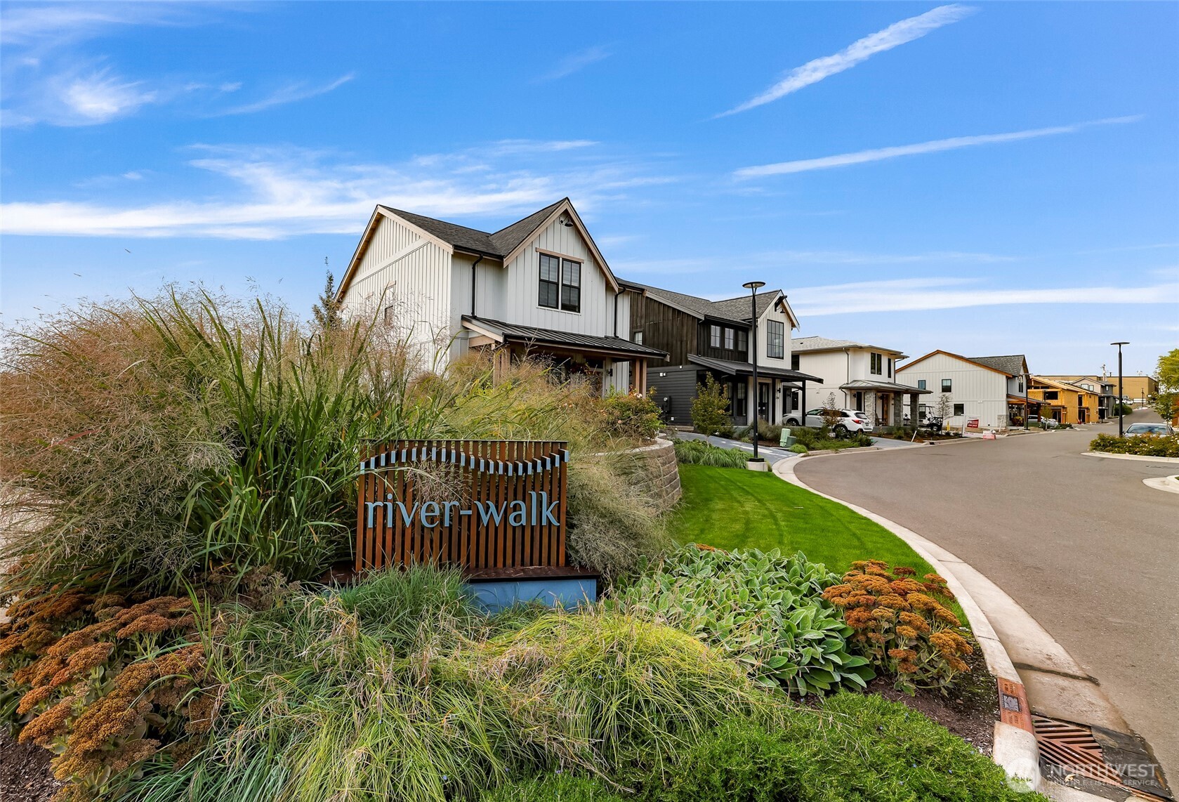 220 Skipping Stone Loop Lynden, WA 98264 - Photo 26 of 26 a front view of a house with garden