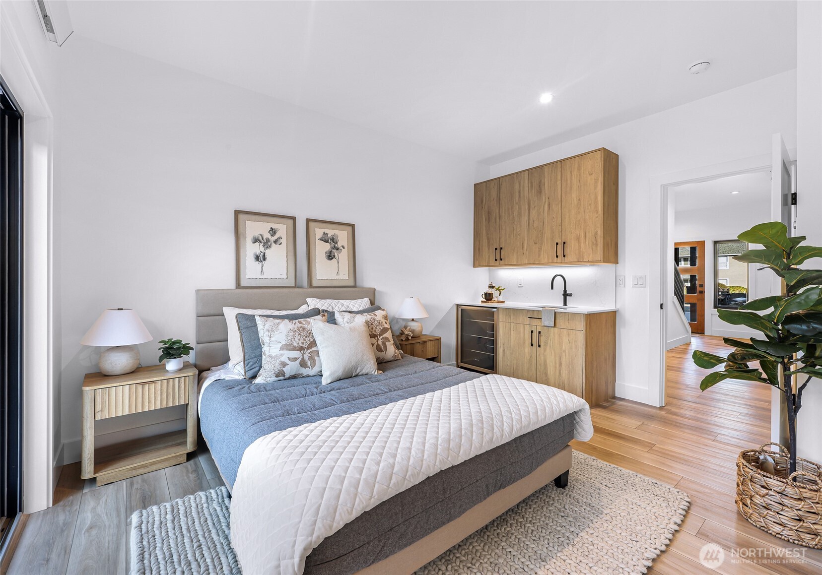220 Skipping Stone Loop Lynden, WA 98264 - Photo 5 of 26 a bedroom with a bed and wooden floor