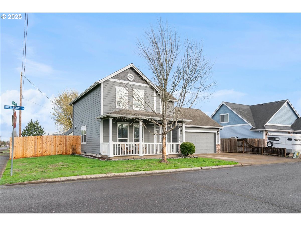 1010 Turtledove Loop Lebanon, OR 97355 - Photo 2 of 36 a view of front a house with a garden