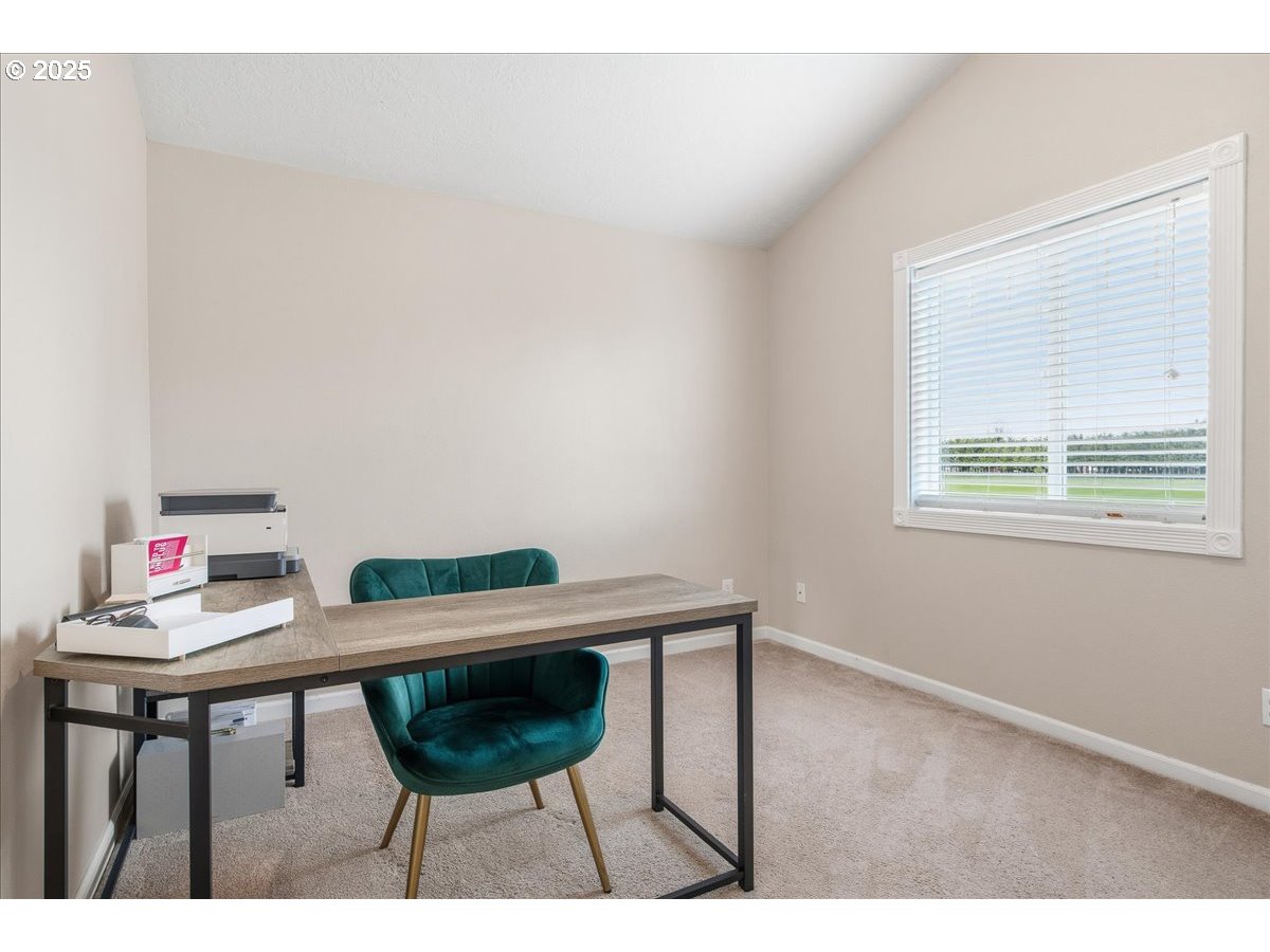1010 Turtledove Loop Lebanon, OR 97355 - Photo 28 of 36 a view of a room with a table and chairs