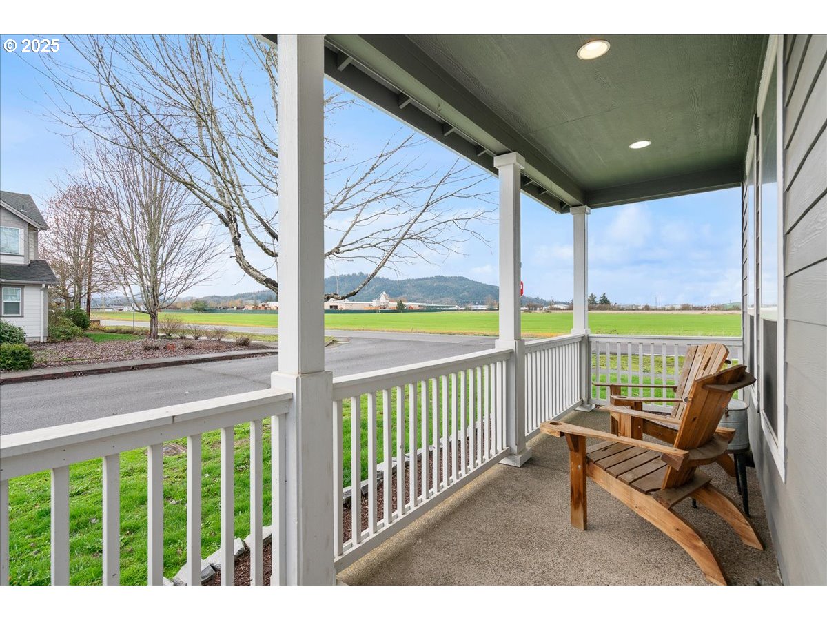 1010 Turtledove Loop Lebanon, OR 97355 - Photo 5 of 36 a view of a porch with furniture and garden