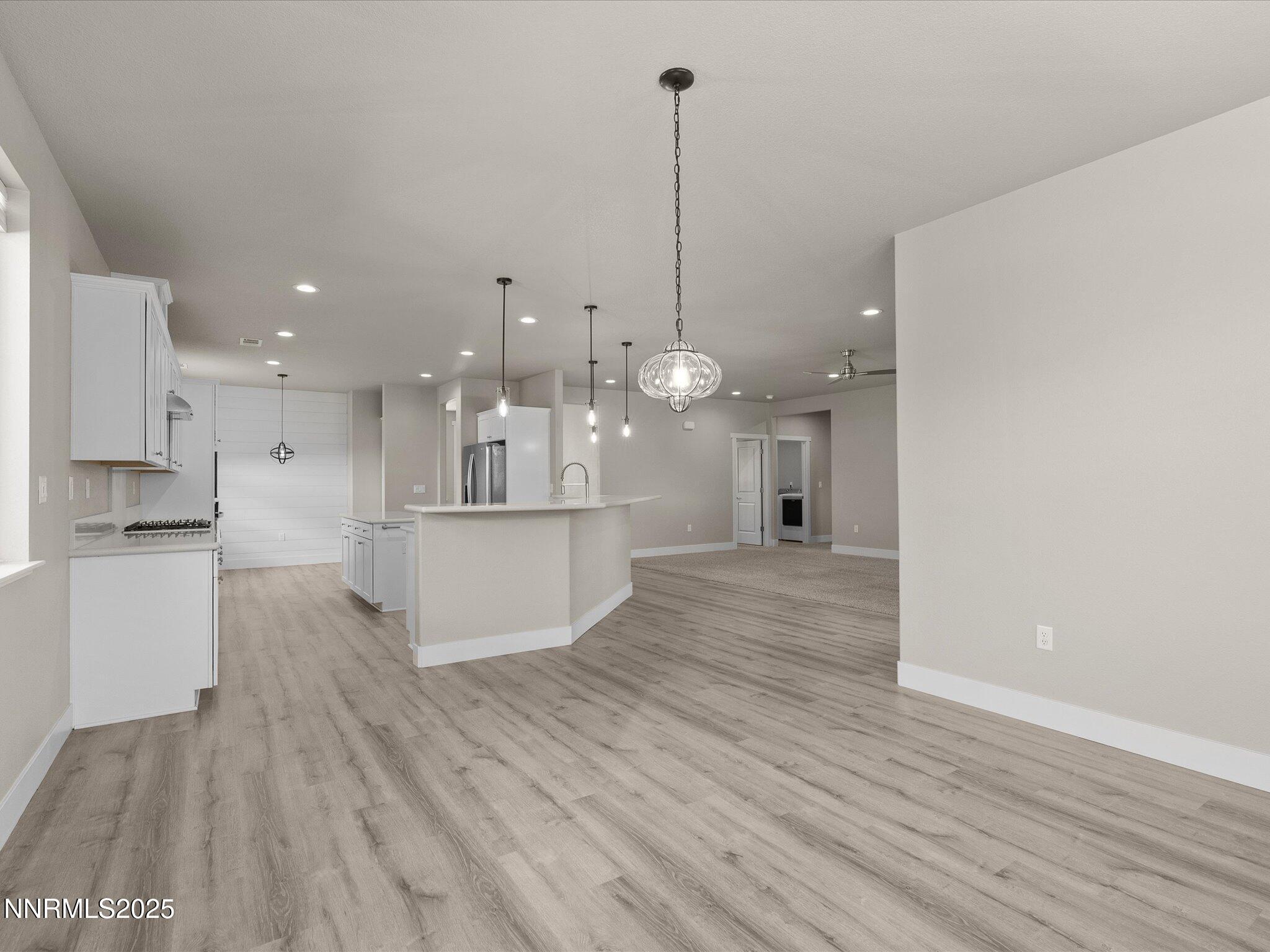 770 East Cottage Loop Gardnerville, NV 89460 - Photo 18 of 38 a view of a kitchen and kitchen counter top space