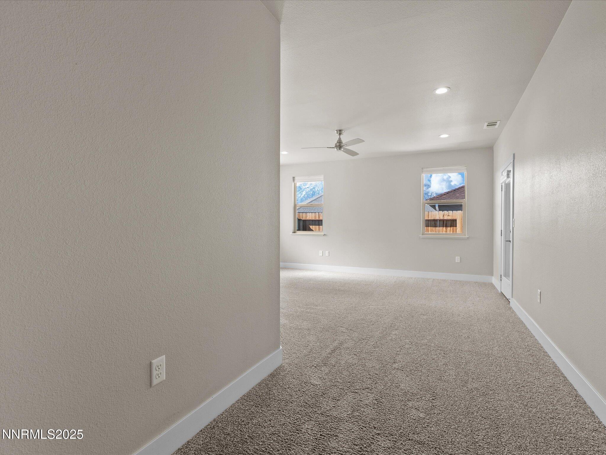 770 East Cottage Loop Gardnerville, NV 89460 - Photo 20 of 38 a view of a hallway with wooden shelves